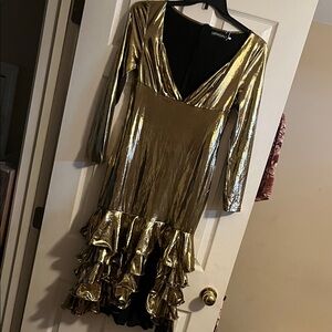Metallic Gold Long Sleeve Ruffle Hem Dress by LONDON